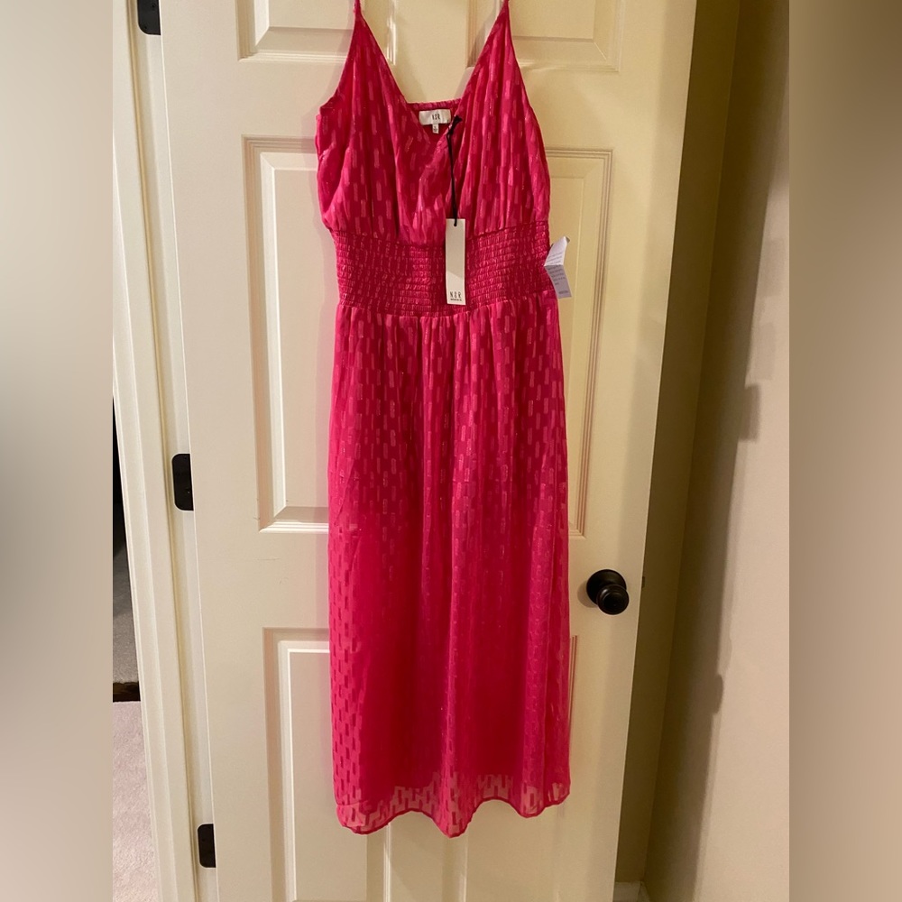 New with tags NSR Sophia dress. Large. Hot pink. Smocked waist adjustable